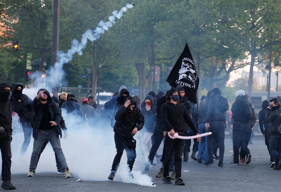  Demonstrators clash with French riot police after partial results in the first round of 2017 French presidential election