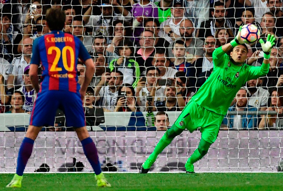 Navas then showed impressive reactions to bat away a Gerard Pique bullet header