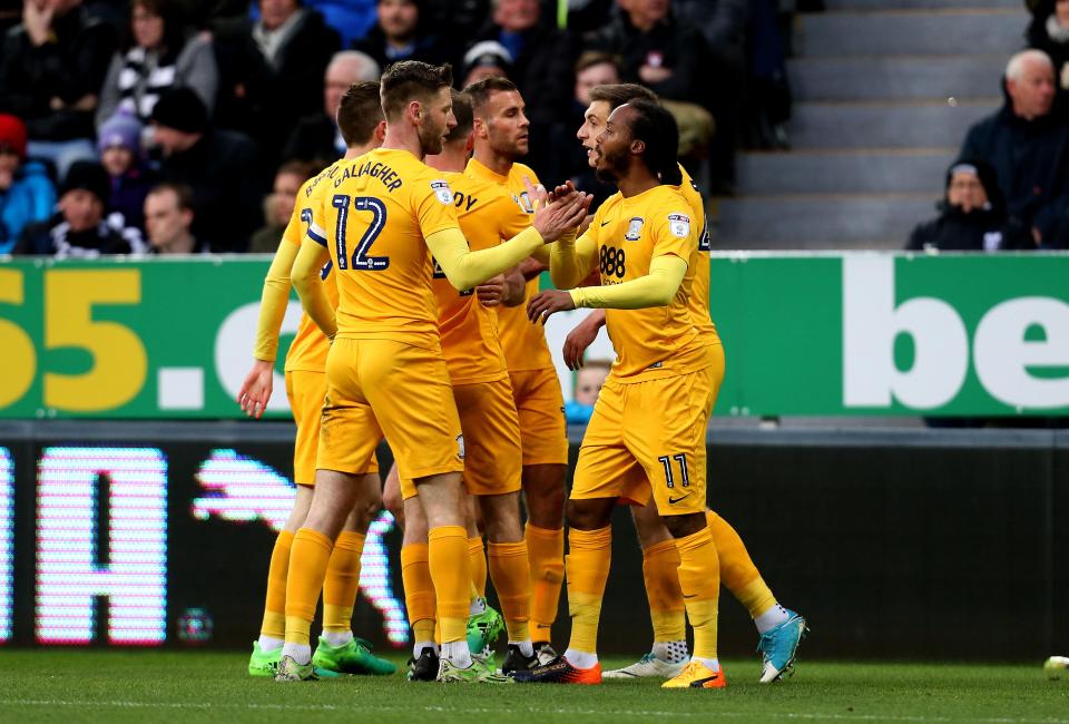  The Preston players celebrate after stunning the home crowd with their first-half equaliser