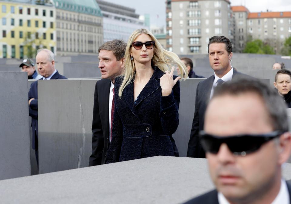  Ivanka Trump was pictured flicking her hair as she walked through the memorial