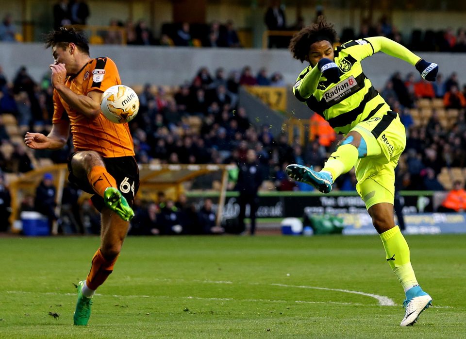  On-loan Huddersfield attacker Iaiah Brown fires in a first-half shot at the Wolves goal