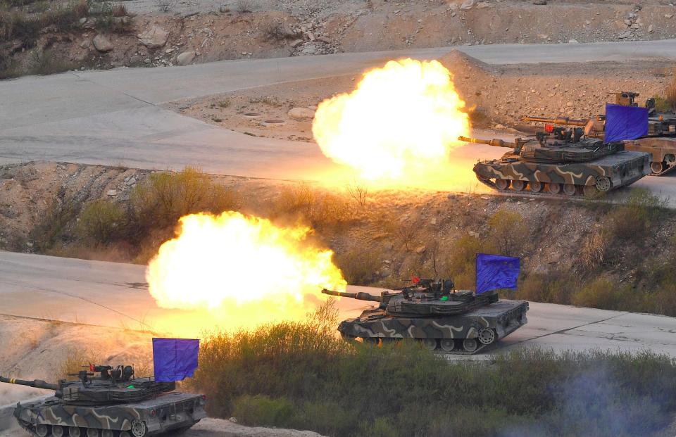  South Korean K1A2 tanks firing live rounds in the coordinated exercise to prepare them for battling tank divisions from the North