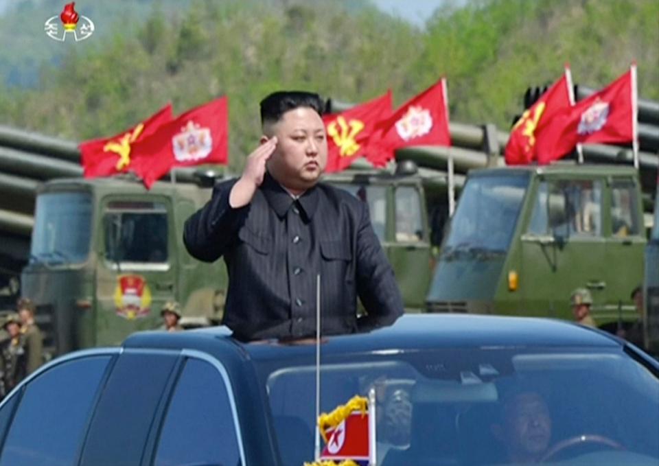  Supreme leader Kim Jong-un arrives to inspect the massive show of force from the North Korean army