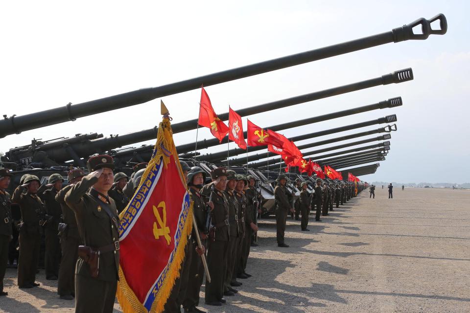  Row after row of formidable field artillery lines up ready for the drill