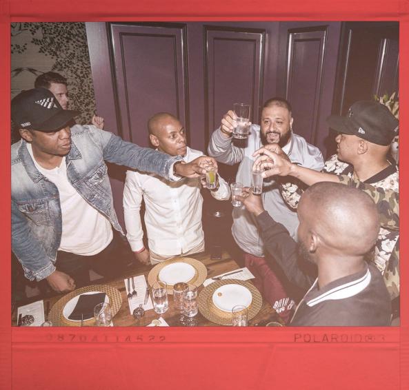 Jay Z proposed a toast to his pals, raising a glass across the dinner table