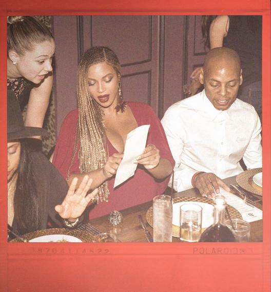 Beyoncé looked to be pouring over the menu