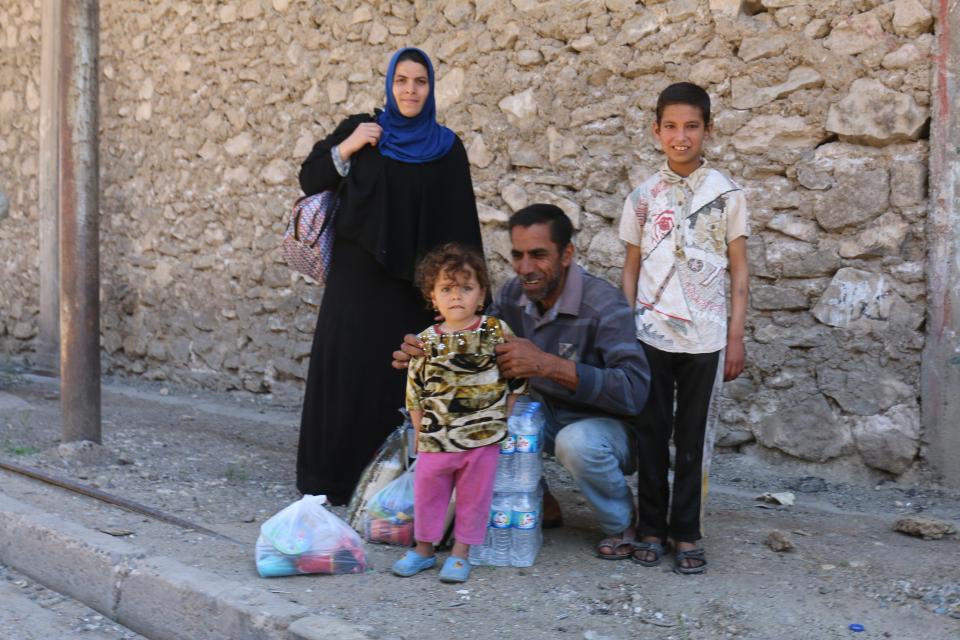  These Iraqi civilians have managed to flee the fighting, but many are still trapped