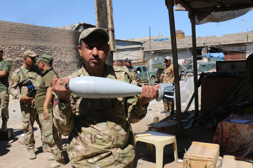  Haydar's sniper unit is paired with a mortar team in western Mosul