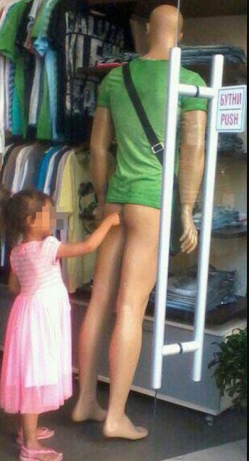 Amusingly, another kid was curious about the mannequins in a clothing shop