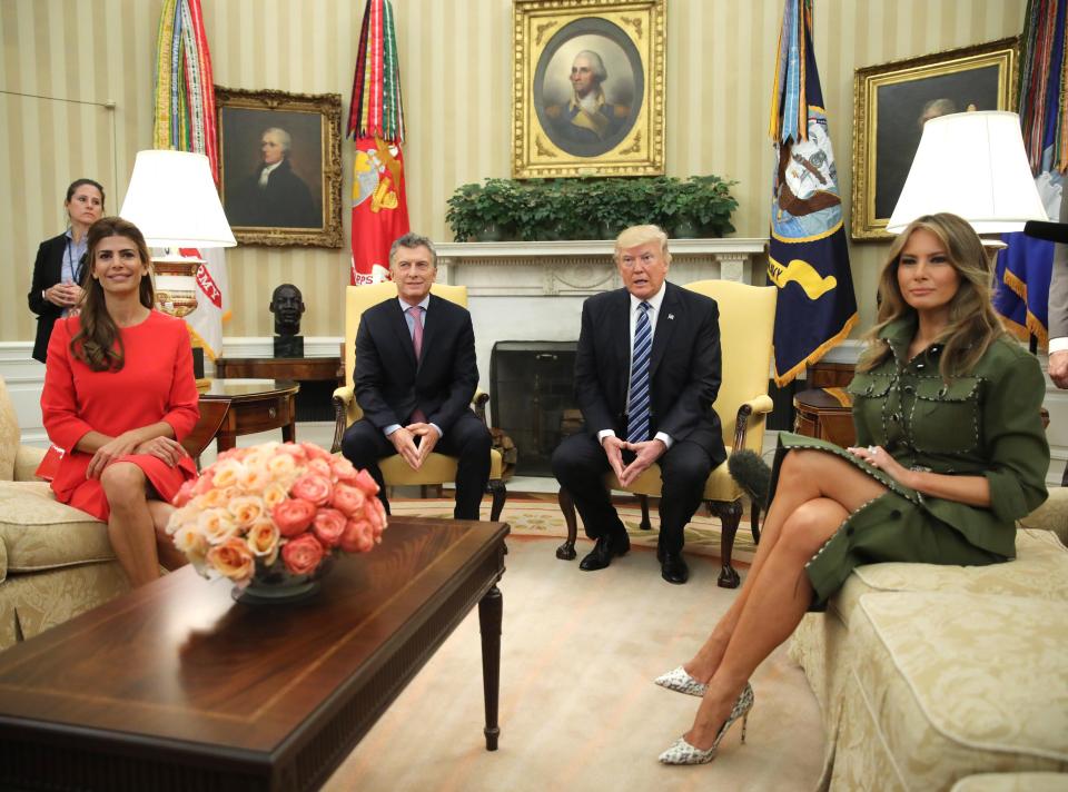  Left to right: Argentina's First Lady Juliana Awada, Argentina's President Mauricio Macri, US President Donald Trump, and US First Lady Melania Trump sit together in the Oval Office of the White House