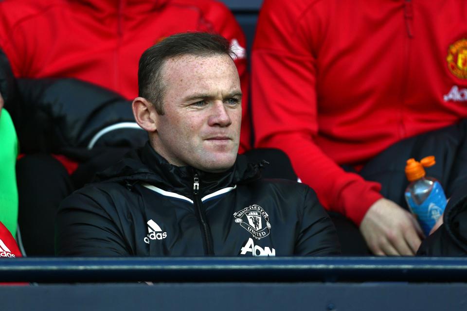  Contemplative Roo . . . Wayne Rooney pictured at Old Trafford watching match