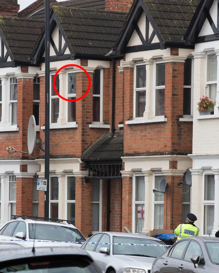  The top floor window of the property appeared to have a bullet hole in the window