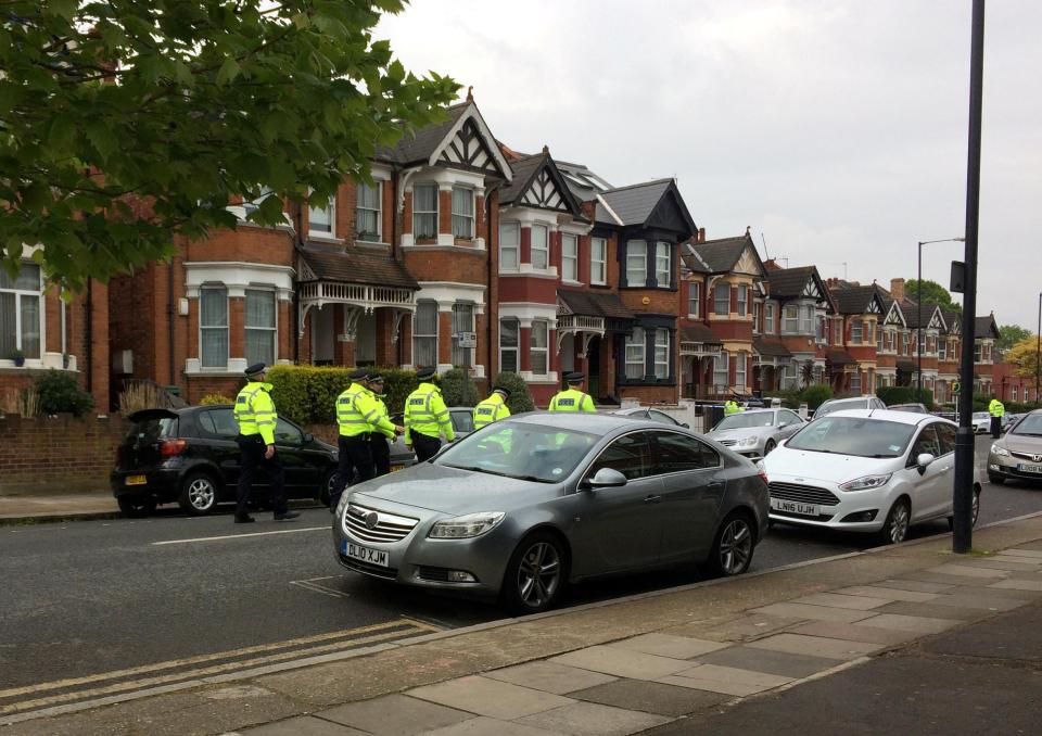  Police at the scene of the raid in Willesden after foiling an 'active' terror plot