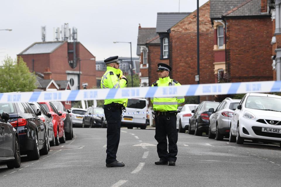  Police officers remain at the cordon today after a raid on a property last night