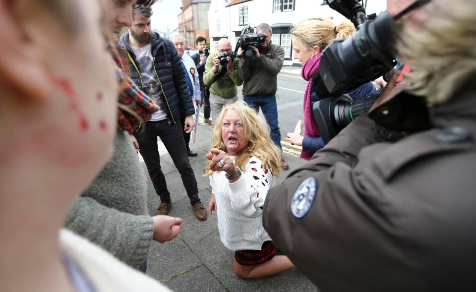  Chaotic scenes just before Mr Nuttall arrived saw one woman left on the floor with a bloodied face after the scrap