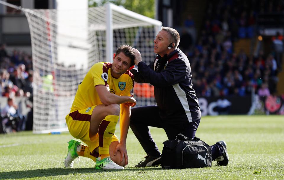  James Tarkowski then has a glaring look towards the area at which the lighter was launched from