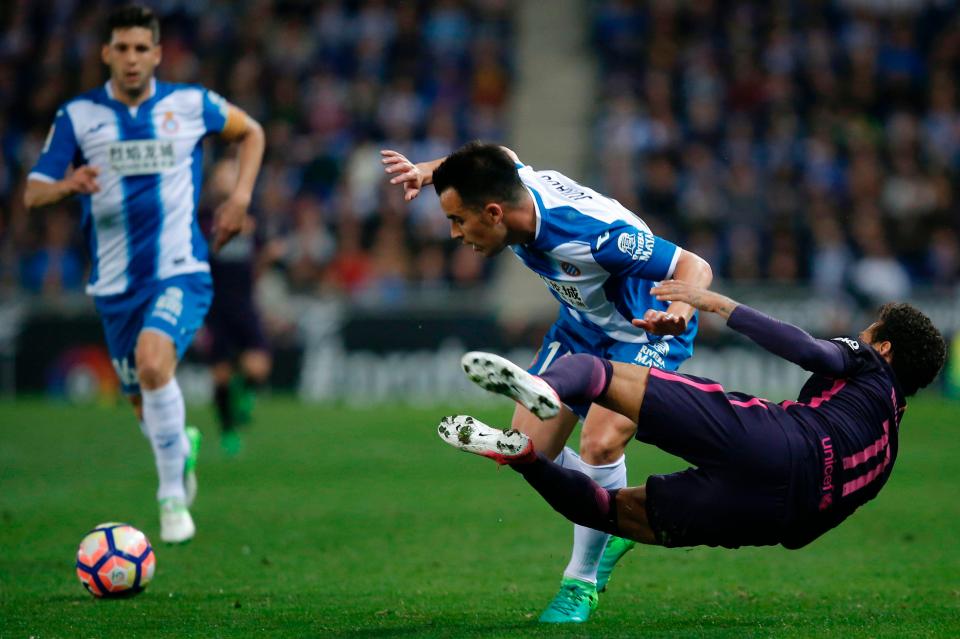  Espanyol man vies with Barcelona star Neymar in the La Liga clash in the first half in Catalonia