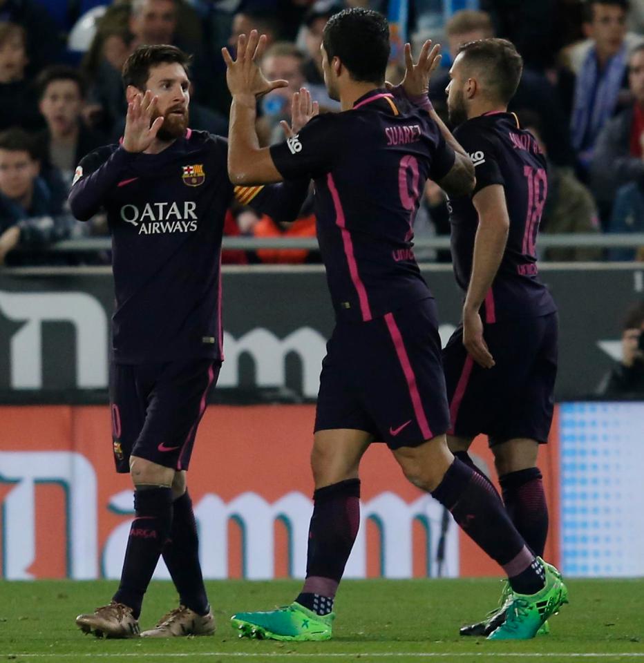  Lionel Messi, Neymar and Luis Suarez celebrate the opening goal in the Barcelona derby