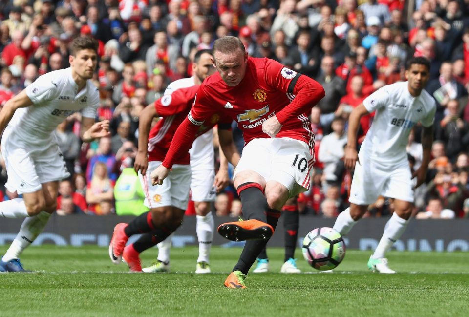  Wayne Rooney slots home from the spot to put Manchester United ahead against Swansea