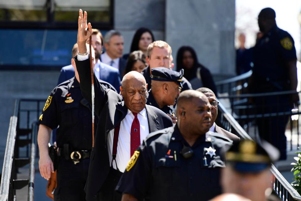  Bill Cosby waves to fans outside the Montgomery County Courthouse in Pennsylvania in April 2018