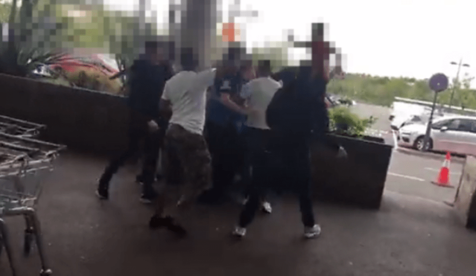  Vigilantes had to step in to protect the man after two shoppers started kicking and punching him as they waited for police to arrive