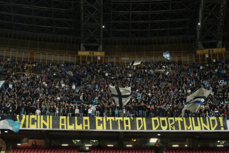 Napoli fans produce banner, which reads: "We're with city of Dortmund"