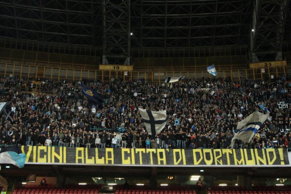  Napoli fans produce banner, which reads: "We're with city of Dortmund"