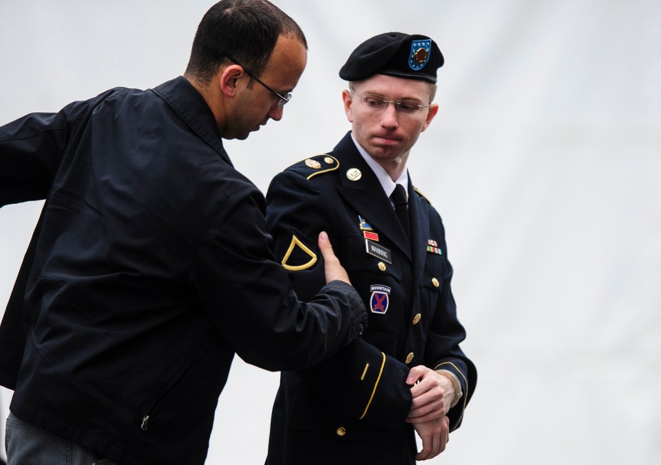  Chelsea Manning - then US Army Private Bradley Manning (right) - arriving at the courtroom at Fort Meade, Maryland, in 2013