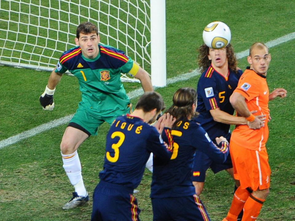 Iker Casillas, Gerard Pique, Sergio Ramos and Carles Puyol defend for Spain