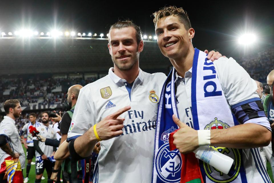 Cristiano Ronaldo and Gareth Bale celebrate winning the Spanish title