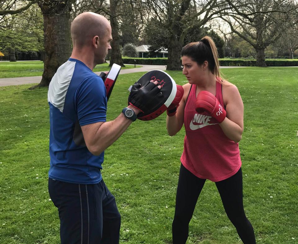  Personal trainer Al gets Megan boxing in her penultimate week - and she gets a kick out of it (geddit?)