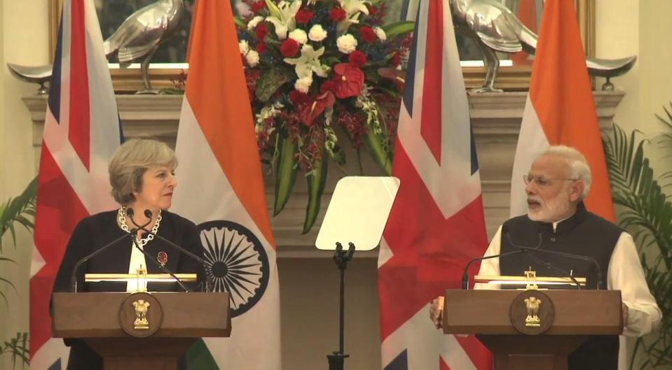  The clip shows Mrs May meeting her Indian counterpart, Narendra Modi