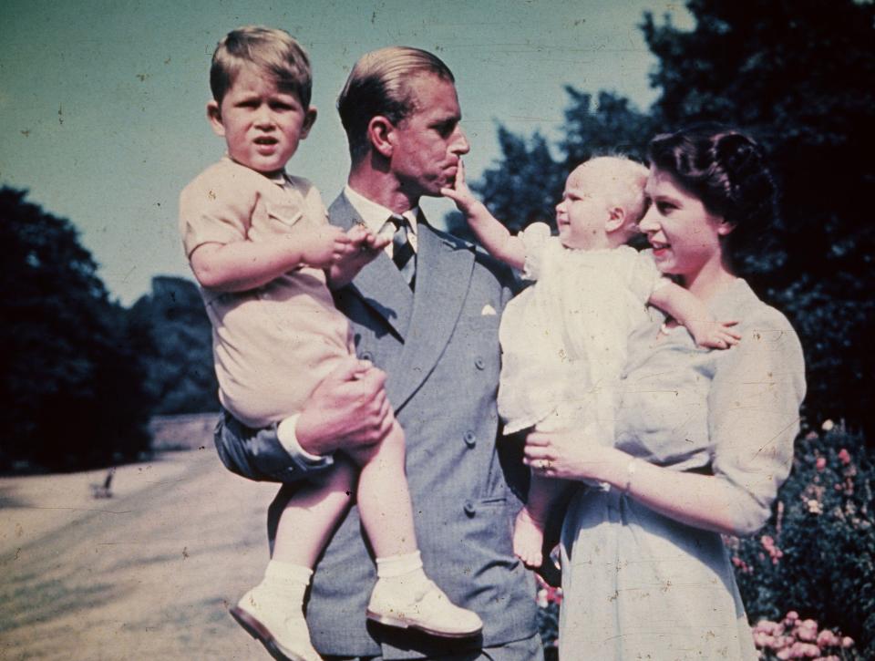  The Queen and Prince Philip with a young Charles and Anne