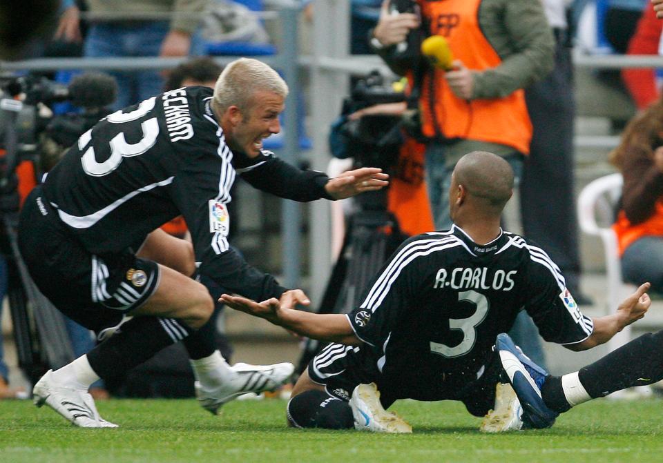  David Beckham and Roberto Carlos celebrate another last-gasp winner