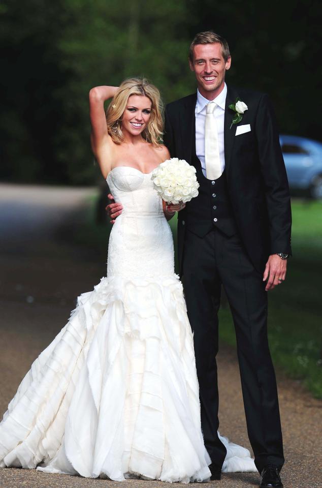  Another one of the designer's famous brides is Strictly winner Abbey Clancy, who wore this stunning strapless dress for her wedding to Peter Crouch