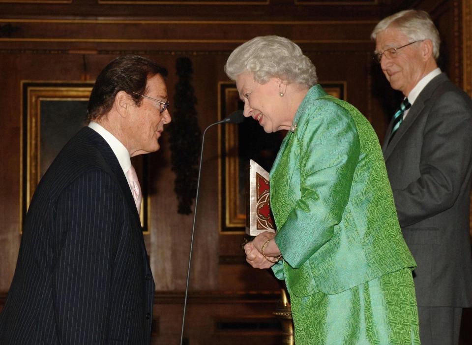  Sir Roger meeting the Queen in 2006