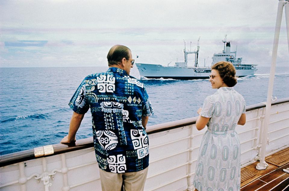  Prince Philip wearing a bold Hawaiian top with the Queen aboard Britannia during their silver wedding celebrations in 1972