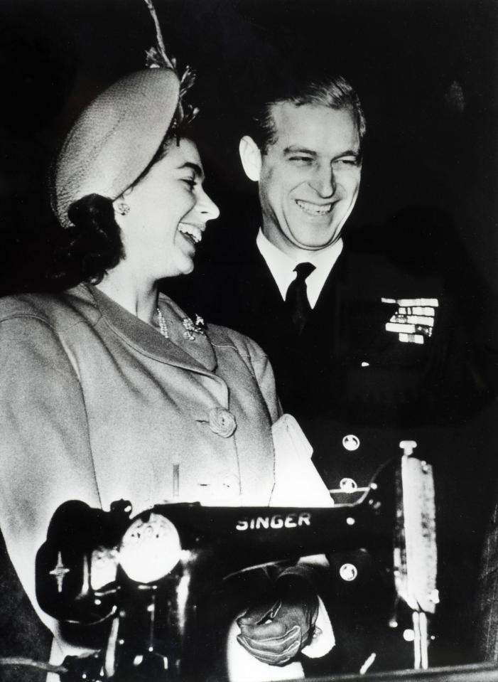  The royal couple share a joke over the Singer sewer machine presented as a wedding gift from the Provost and Council of Clydebank, where the Singer factory was based