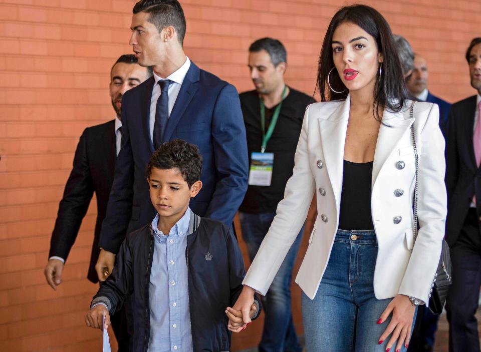  Ronaldo has one son, with an unknown mother, who shares his name, both pictured here with Georgina Rodriguez