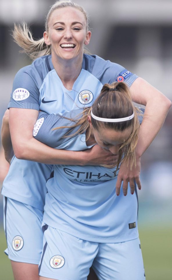  Kosovare Asllani celebrates another Manchester goal with scorer Toni Duggan