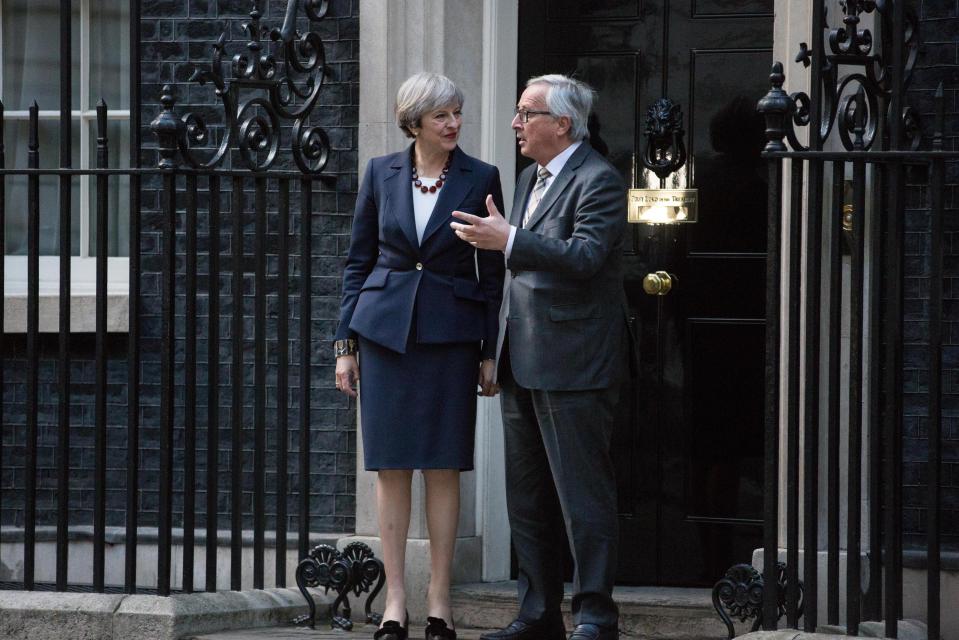  Juncker allegedly told May the EU 'wasn't a golf club' when she said Britain wouldn't have to pay a divorce bill