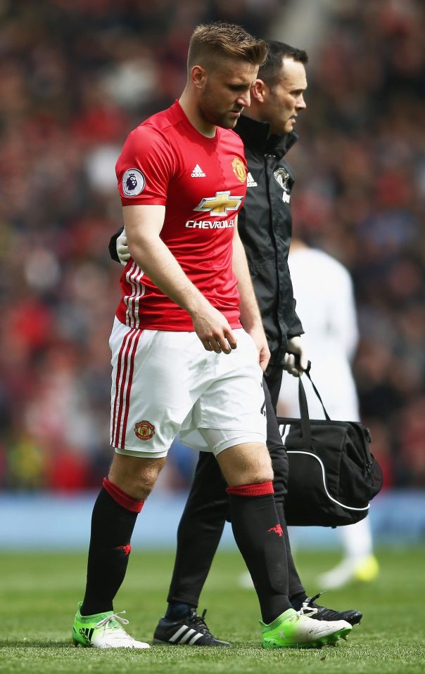  Luke Shaw is helped off the pitch on Sunday in the latest injury blow to strike United