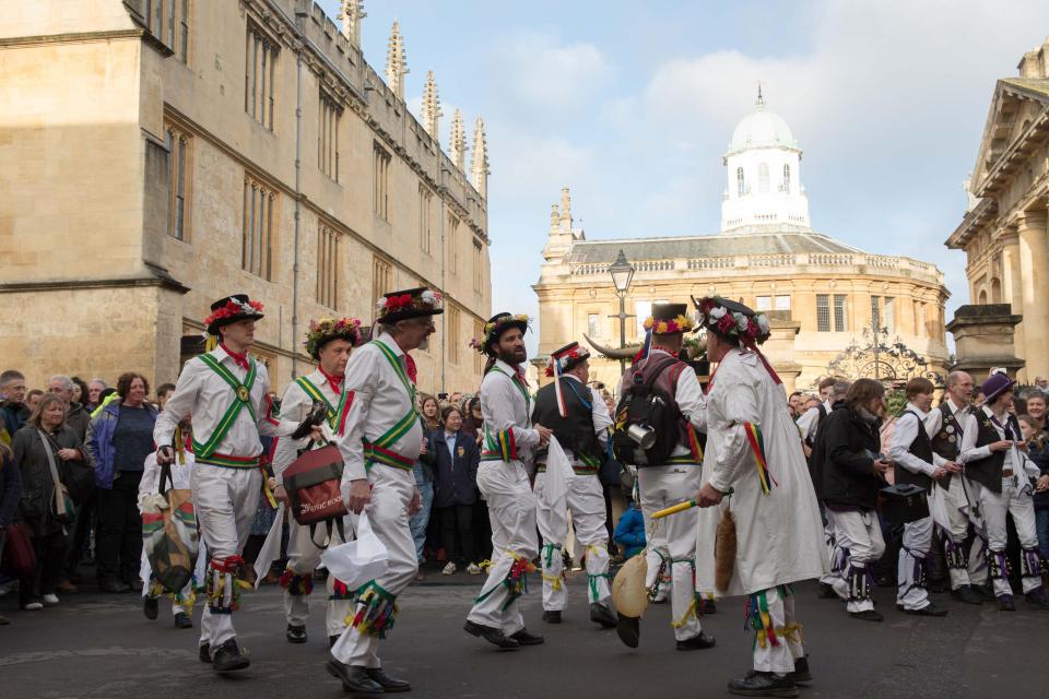  Dancers parade through historic Oxford's streets as thousands watch on