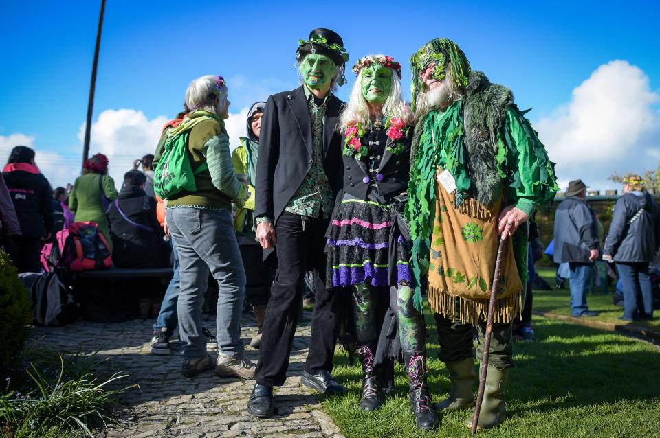  People in fancy dress in Glastonbury celebrate the pagan festival of Beltane