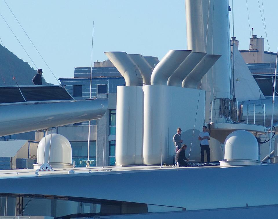  Sailors aboard the mega-yacht as it prepares to be handed over to Andrey Melnichenko