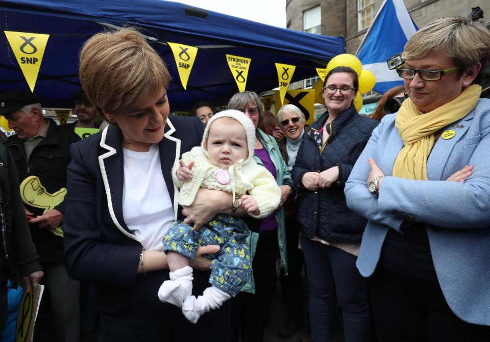  She was seen campaigning in Leith with a cute baby dressed in pale yellow knitwear