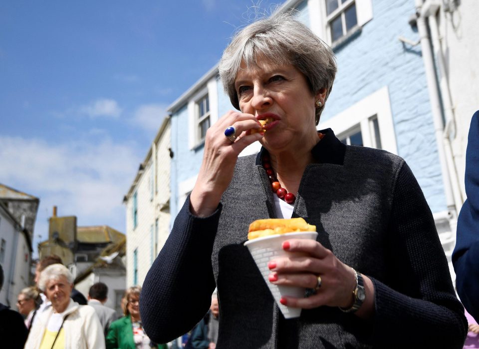  The PM was snapped munching on the campaign trail in Mevagissey, Cornwall