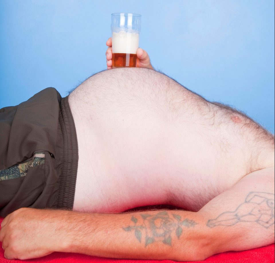  Study found drinking one less 330ml serving of beer daily and having water instead reduced the risk of being fat by 20 per cent