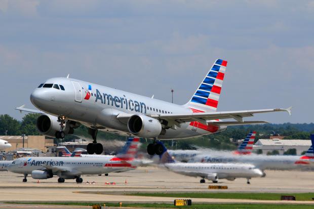 A black woman claims American Airlines, downgraded her on a flight while her white friend stayed in First Class