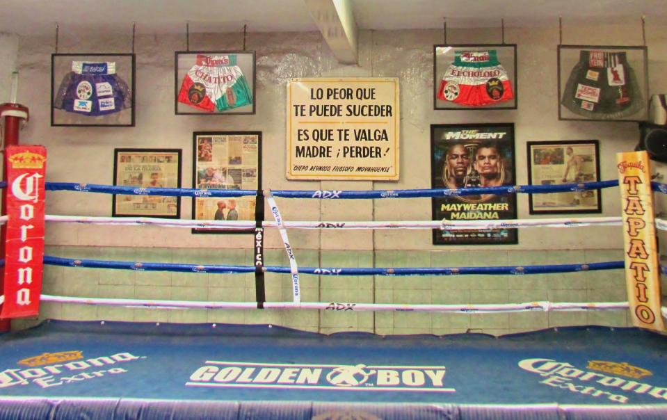  The boxing ring at the Julian Magdaleno Gym in Guadalajara is surrounded by framed shorts from Canelo's title fights